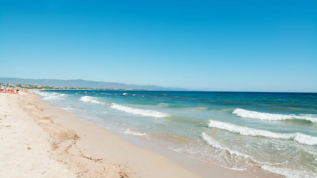 Surfing In Sardinia: 12 Top Spots and 3 Tours 4 Spiaggia del Poetto 6